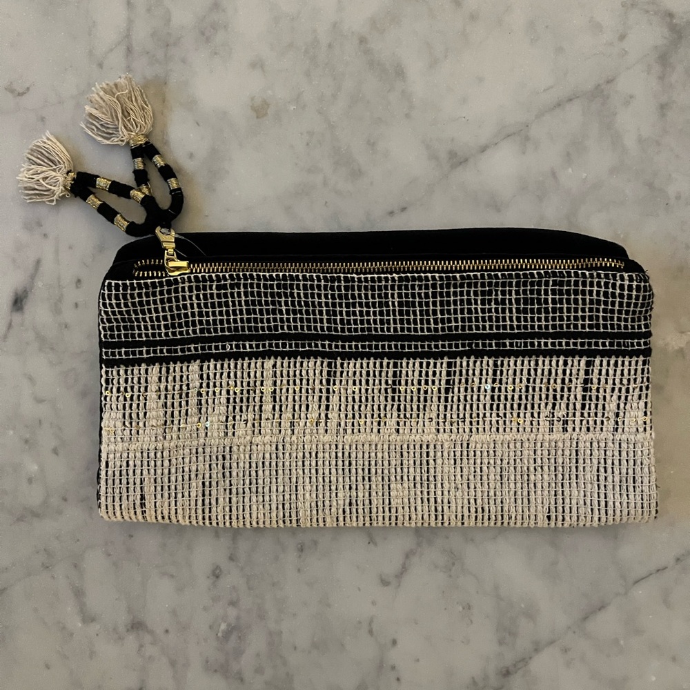 Elegant Fold-Over Black and Cream Clutch
